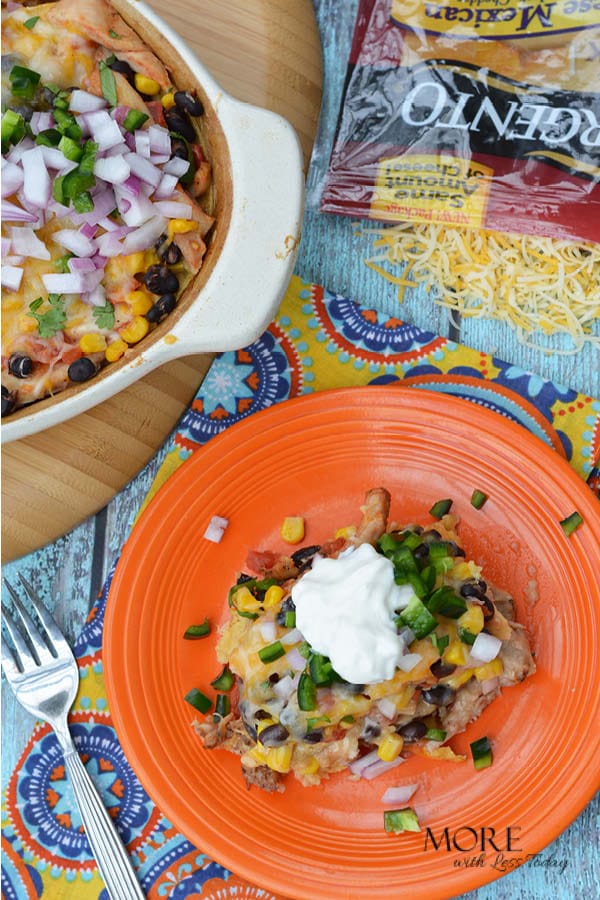 Mexican Cheese Bake recipe plated with a dollop of sour cream