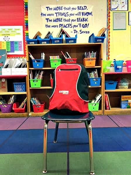 elementary classroom photo with school supplies and a Dr. Seuss quote on the wall
