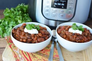chili in the instant pot with toppings