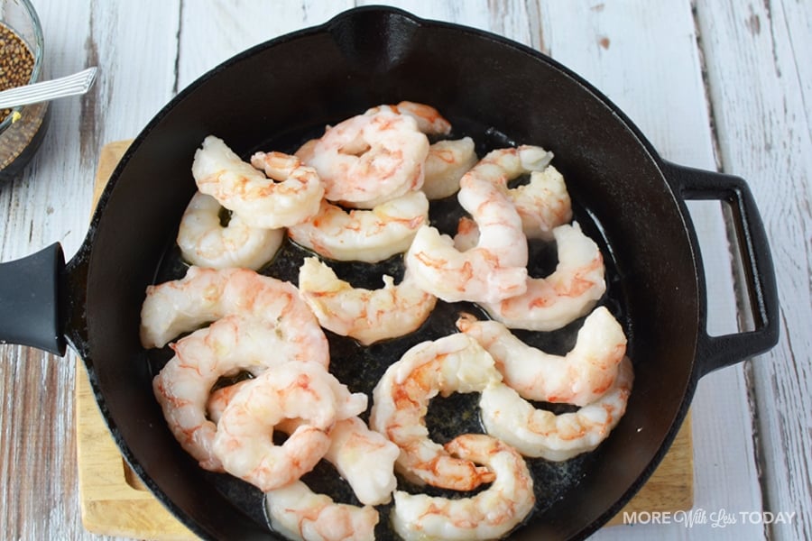 cooking shrimp in a pan