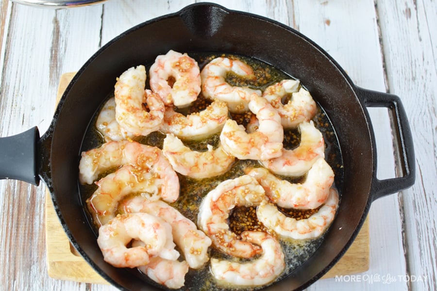 stovetop shrimp cooking in a pan