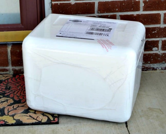 Omaha Steaks cooler delivery at a doorstep