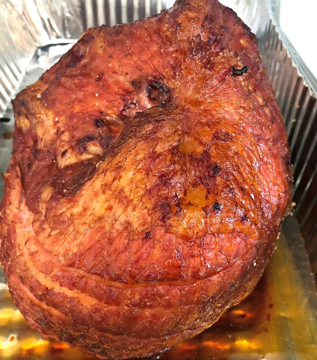 photo of fully cooked spiral-sliced ham in the oven from Omaha Steaks