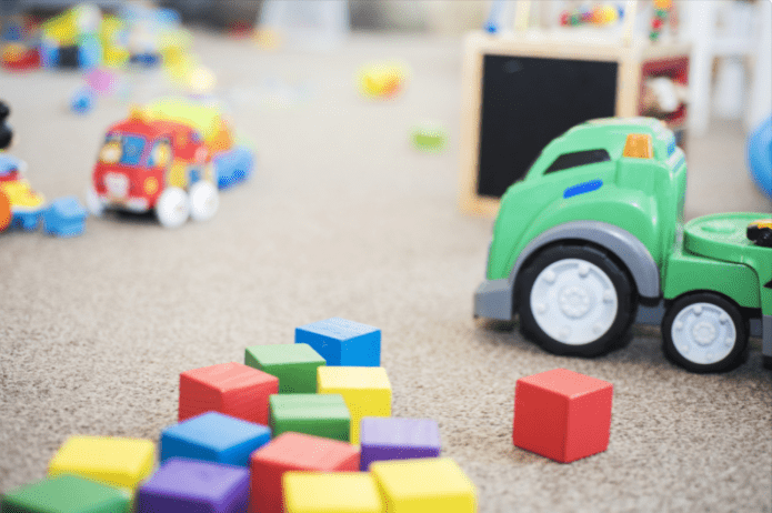 colorful kids blocks and toys on the rug