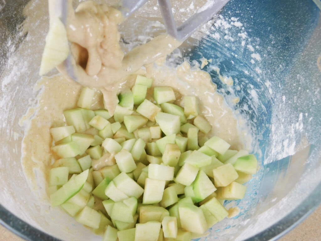 mixing in apples and batter for Homemade Apple Fritters Recipe 