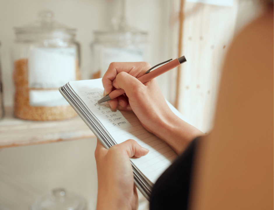 A woman listing her budget