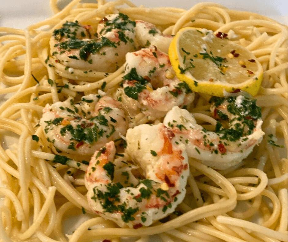 Easy Lemon Garlic Shrimp Scampi with Pasta served on a white plate