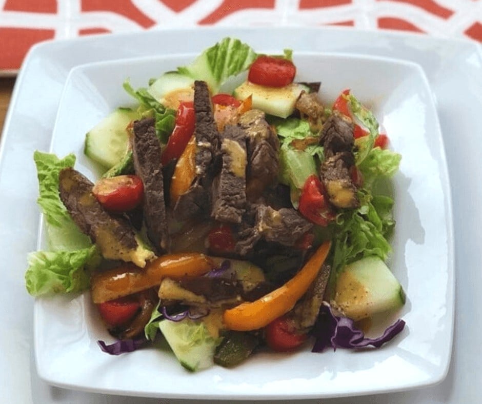 A serving of Fajita Steak Salad on a plate