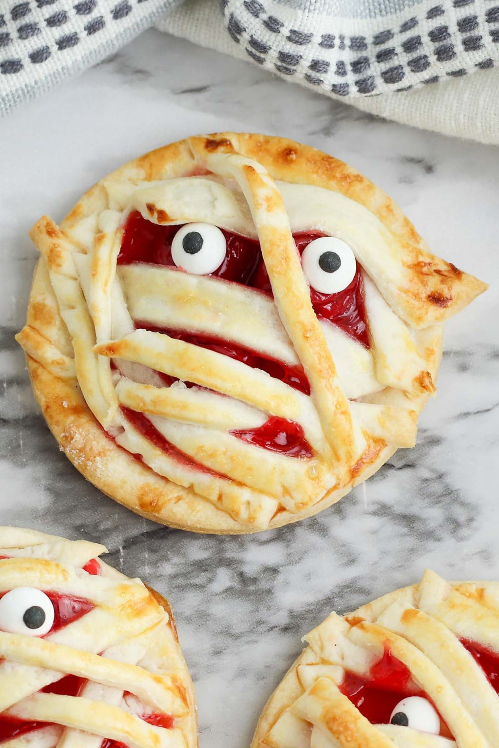 Halloween Desserts - Mummy Cherry Hand Pies recipe