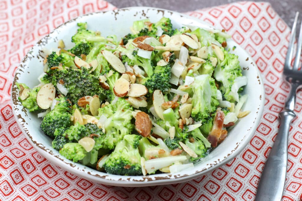 Broccoli Salad Recipe served on a plate with fork