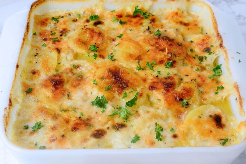 The Easiest Cheesiest Delicious Scalloped Potatoes Recipe