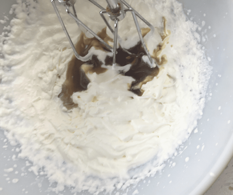 Balsamic Baked Peaches whipped cream beating with a mixer