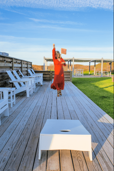 Lori Felix cornhole game at Lively Beach