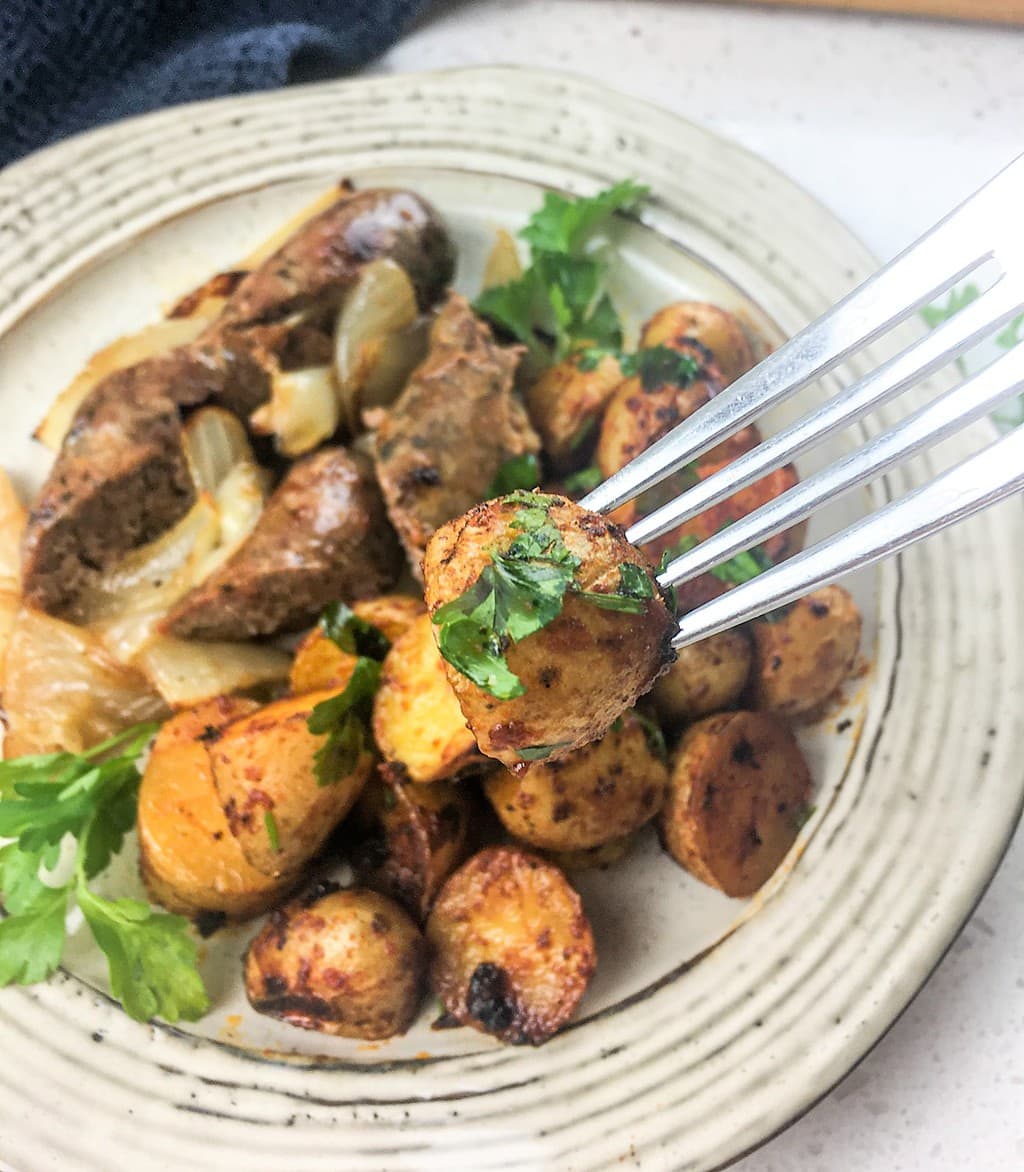piercing a potato with a fork chorizo recipe