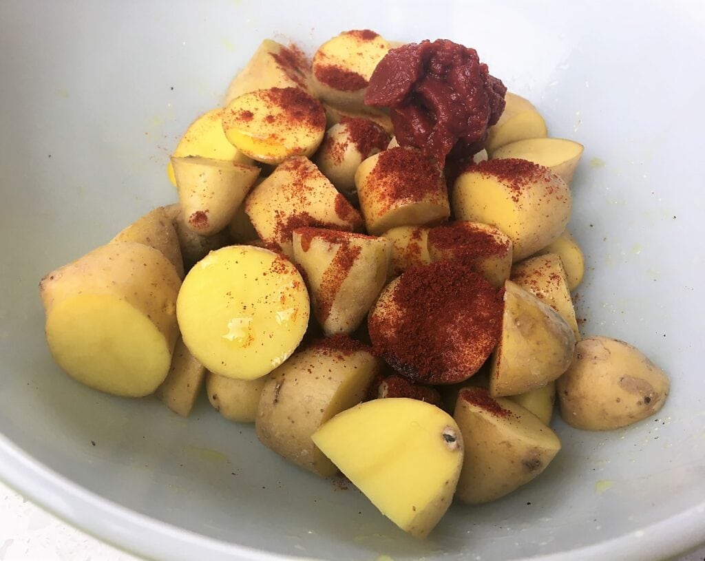 chopped potatoes sprinkled with Spanish paprika