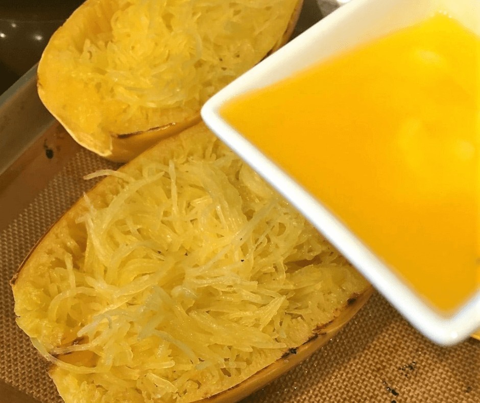 Adding butter to the Spaghetti Squash