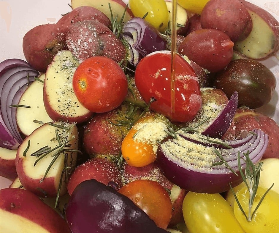 Adding some olive oil on the Roasted Potatoes