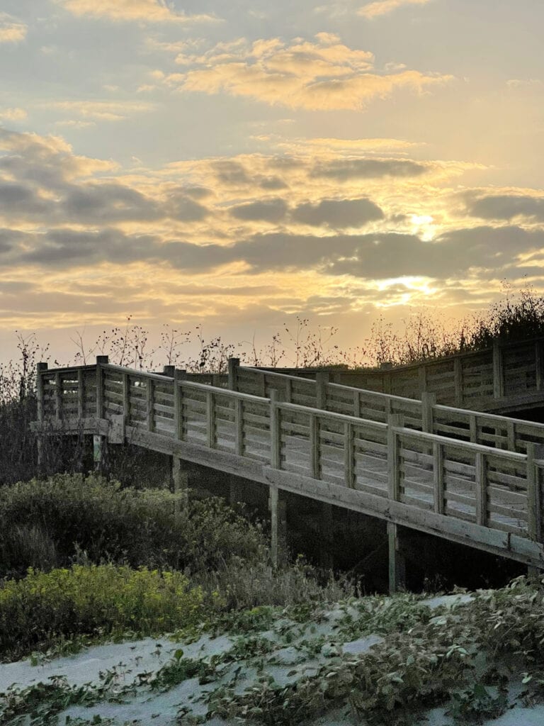 Lively Beach boardwalk at sunset