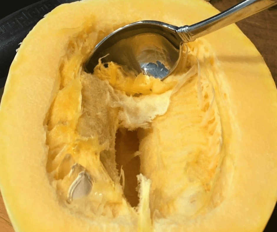 Removing the seeds from the squash