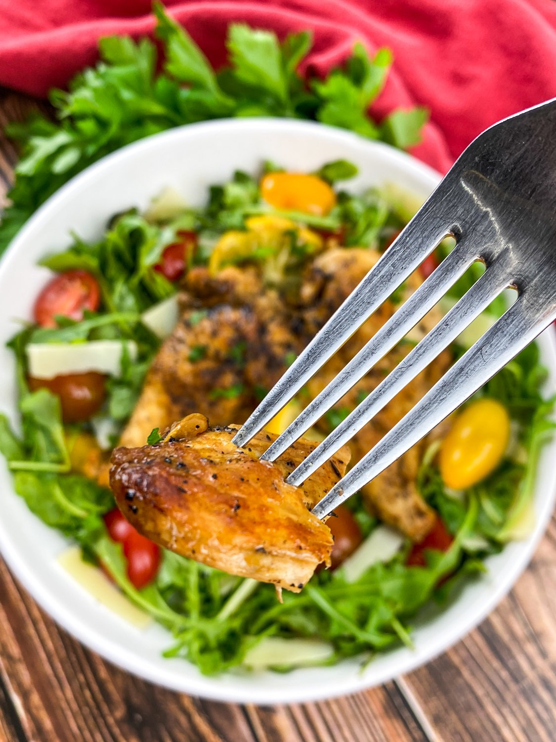 Chicken Paillard Salad in a large white bowl