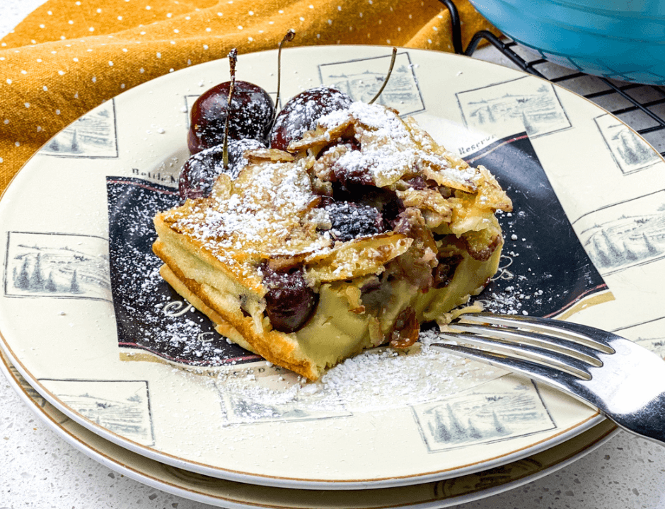 Cherry Almond Clafoutis served on a white plate