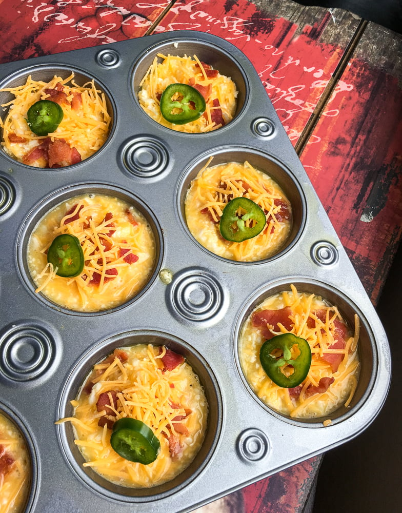 raw muffins on a cupcake tin 