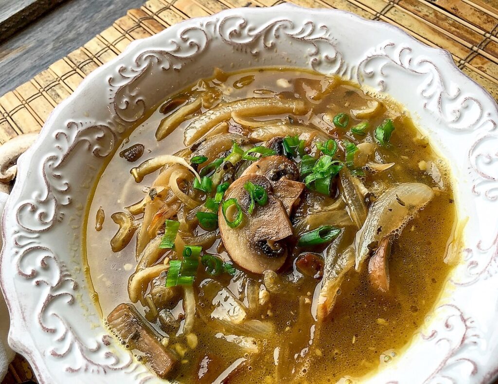 daikon noodle soup on a white bowl