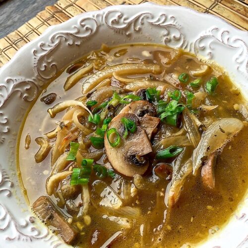 daikon noodle soup on a white bowl