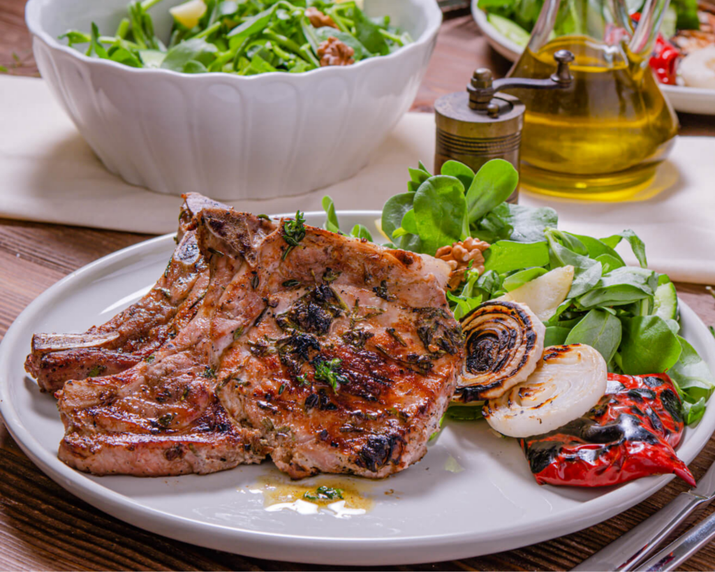 Grilled Pork Chops on a white plate