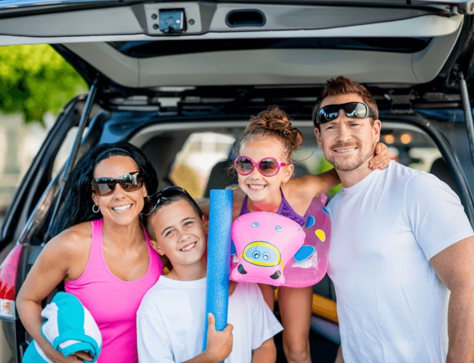 A photo of a family in summer outfits