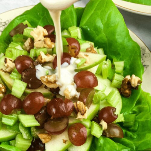 Pouring the dressing on the Deconstructed Waldorf Salad