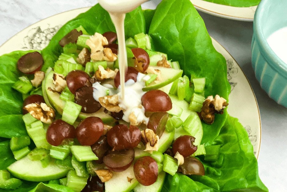 Pouring the dressing on the Deconstructed Waldorf Salad
