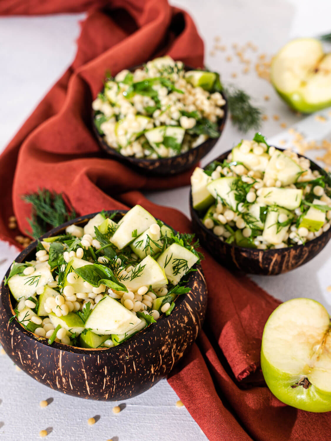 Three bowls of Couscous with Green Apple Salad