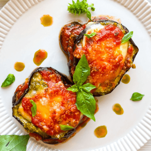 Two pieces of Eggplant Pesto Parmesan