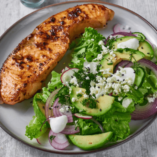 A plate of Grilled Salmon Citrus Salad