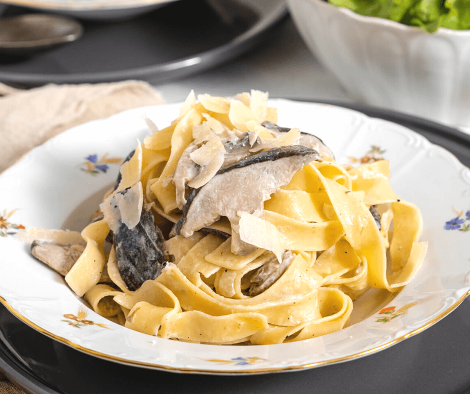 Creamy Mushroom Alfredo Pasta on a white plate