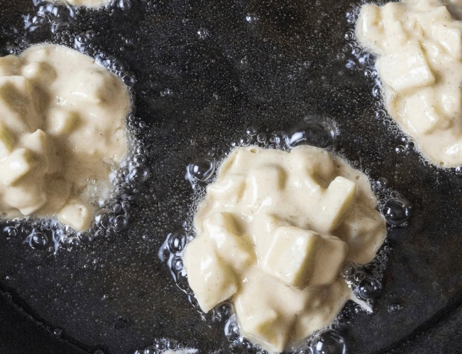 Frying the Apple Fritters on a pan