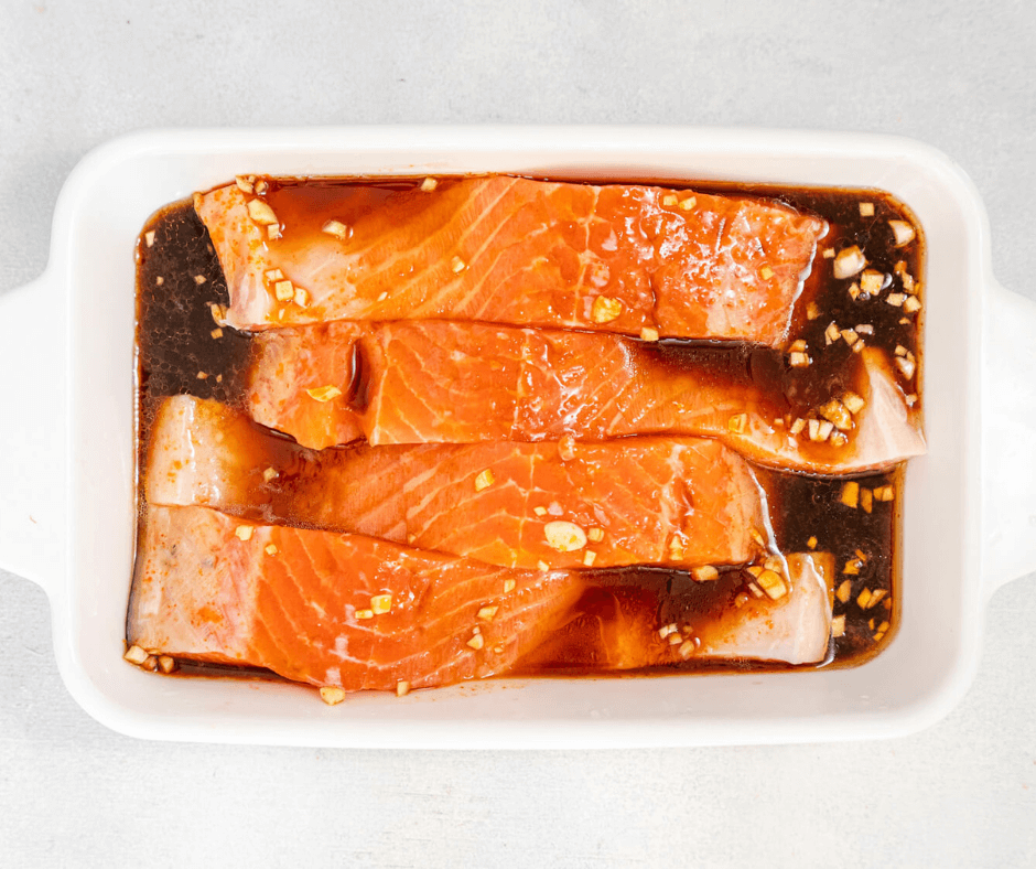 Marinating the salmon fillets on the honey sriracha marinade