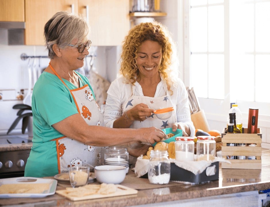 Two women cooking in a kitchen