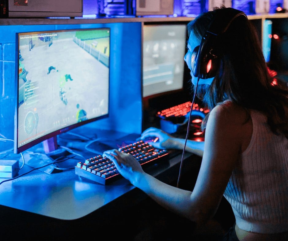 A woman sat down while playing a video game