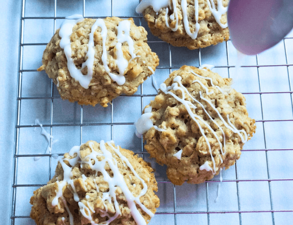 Adding the glaze on a freshly baked Apple Oatmeal Cookies