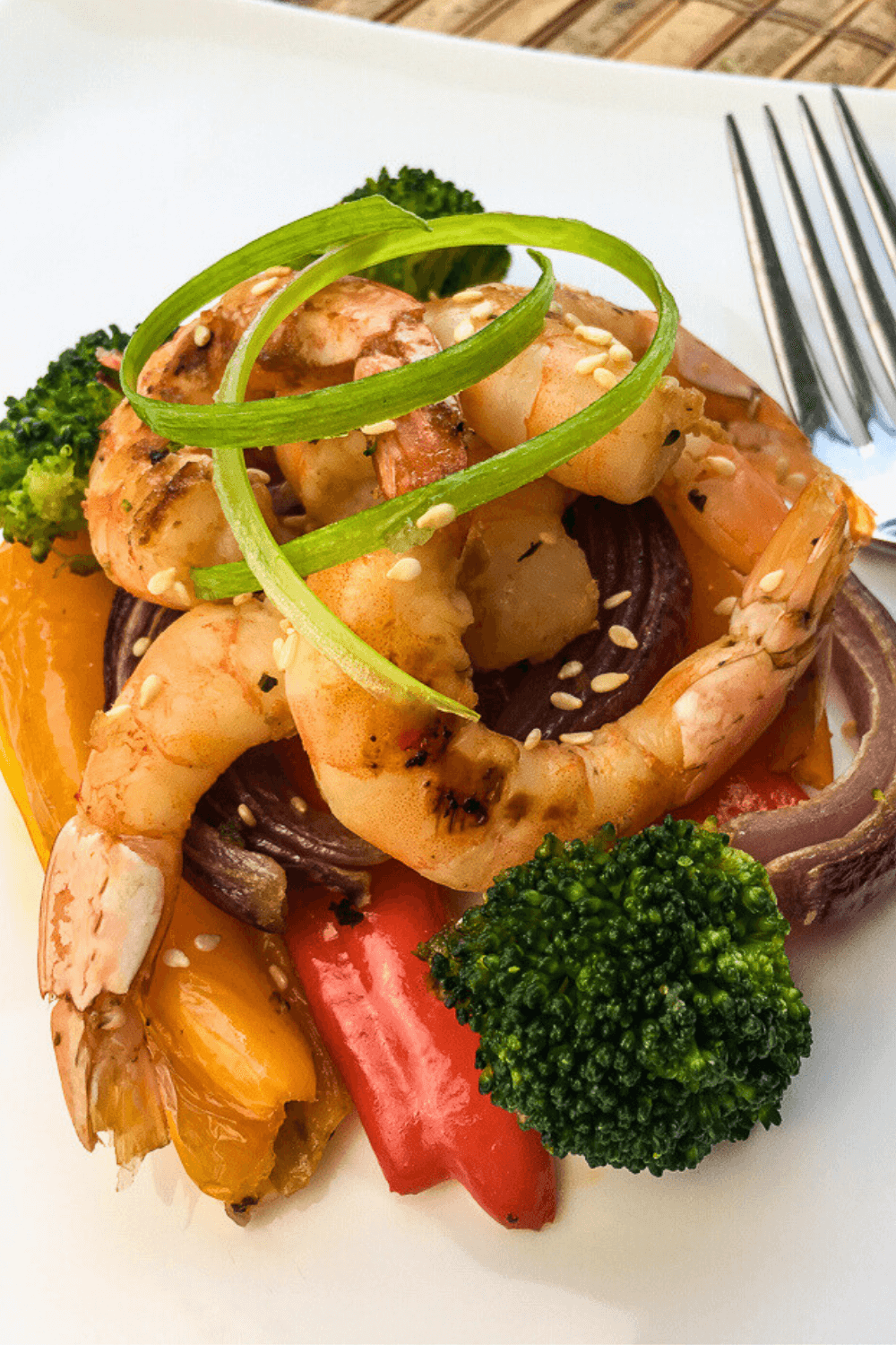 A closeup of a serving of Easy Roasted Shrimp and Vegetables