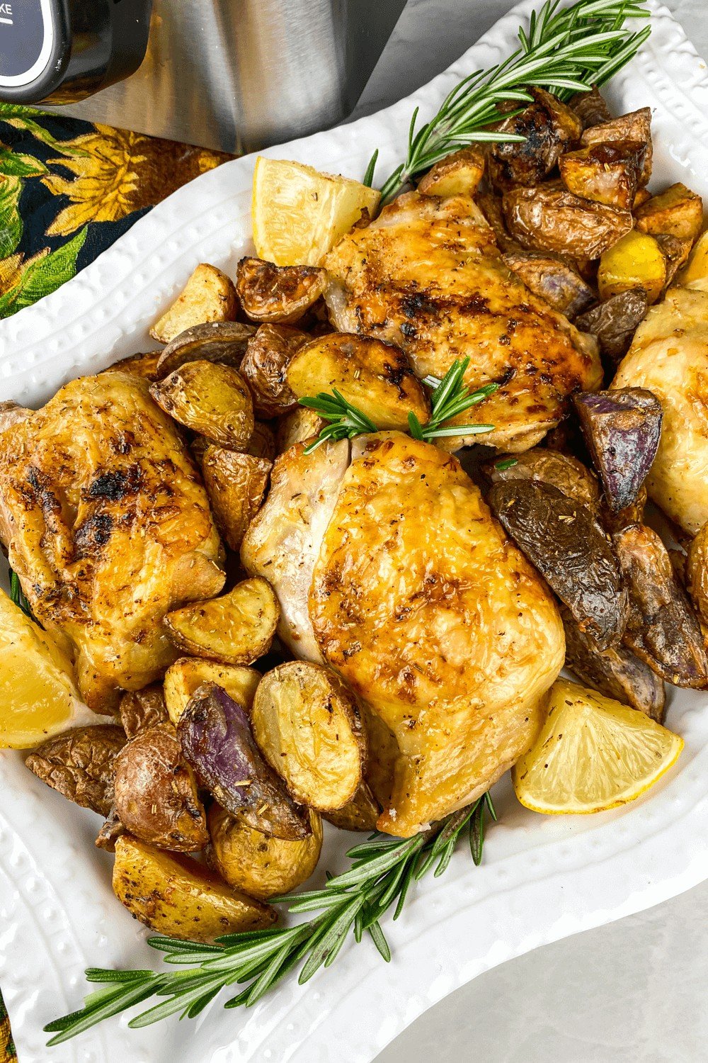 A full plate of Rosemary Lemon Boneless Chicken Thighs