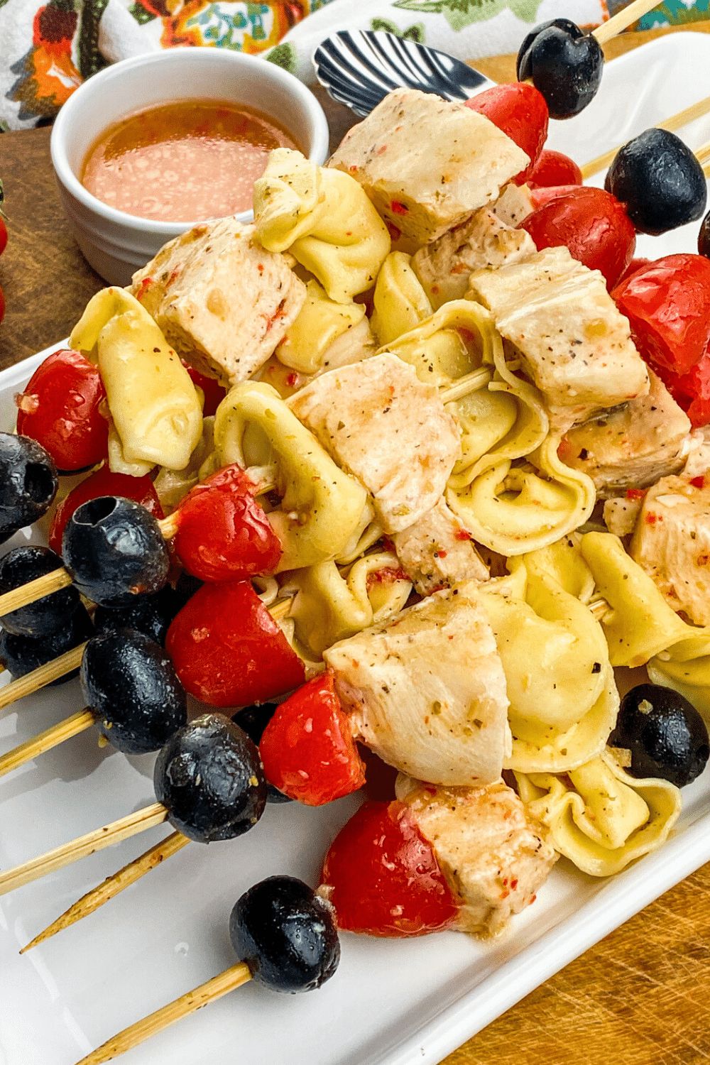 A plate full of Chicken Tortellini Skewers