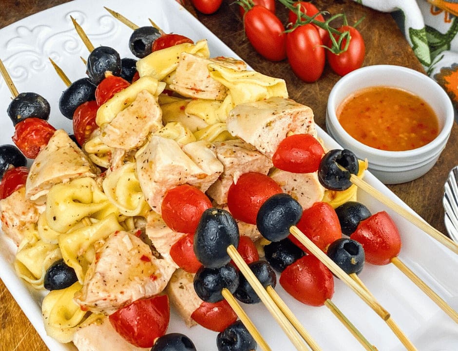 Easy Chicken Tortellini Skewers served on a white plate