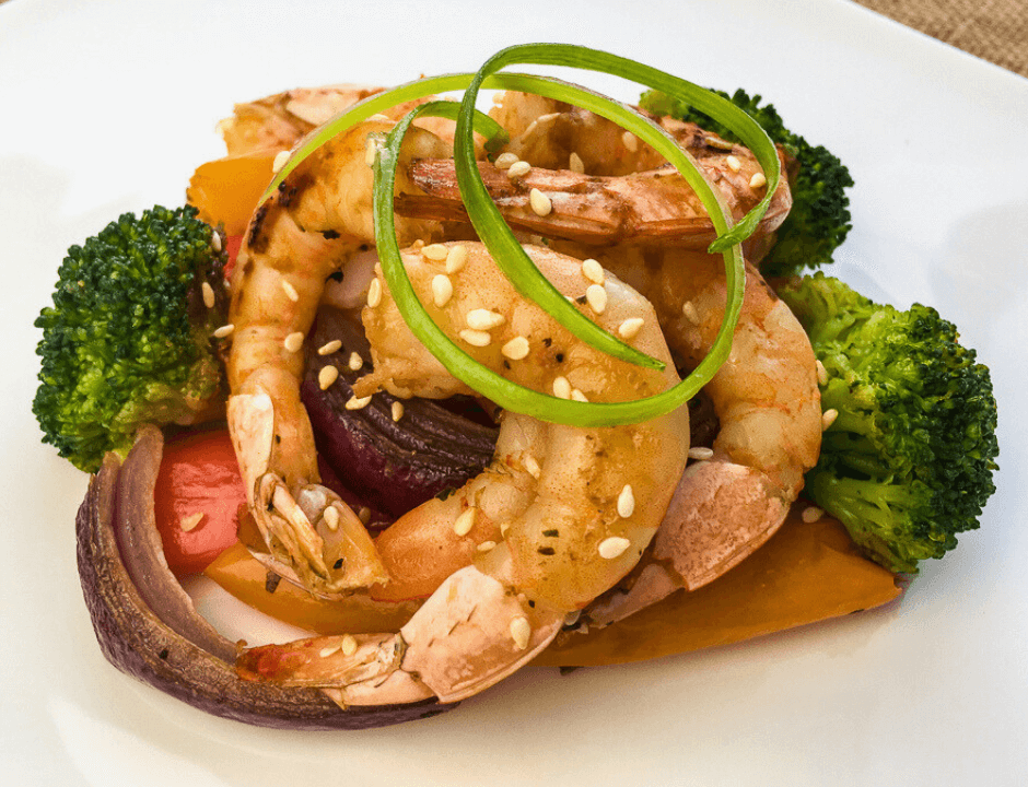 Easy Roasted Shrimp and Vegetables served on a white plate