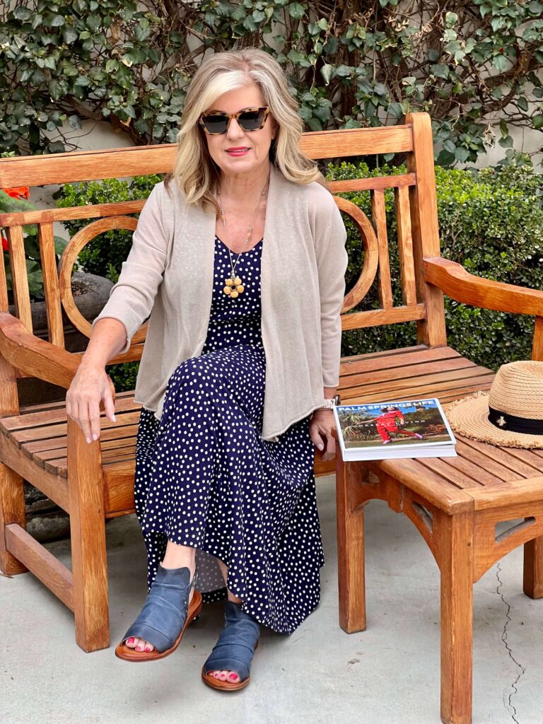 Lori wearing the No Dot About It Knit Dress, Fermie Leather Sandals, and Essential Sweater Shrug from Coldwater Creek