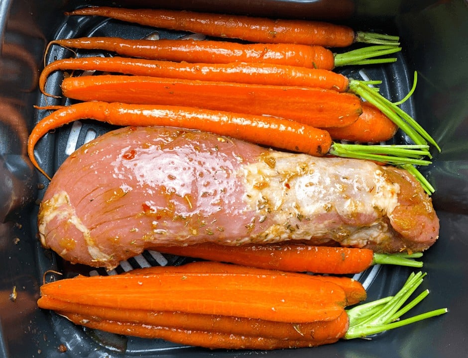 Pork Tenderloin and carrots seasoned with orange chili glaze