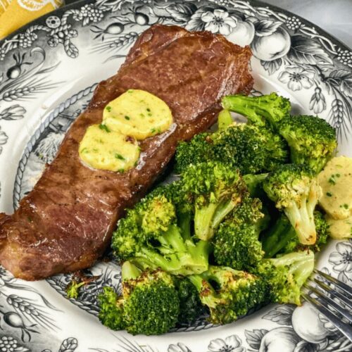 A serving of Air Fryer Steak with Garlic Butter on a plate