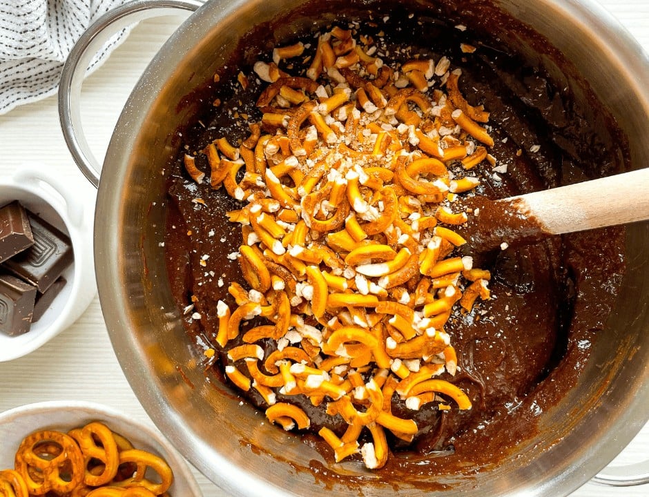 Crushed pretzels on a brownie batter